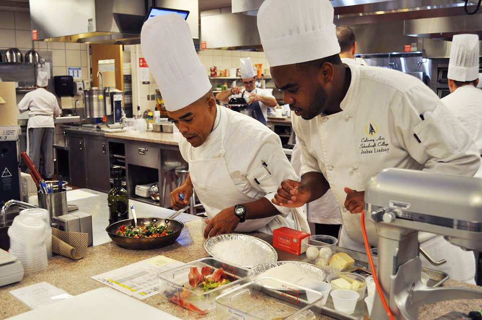 Photo of Chef Shawn Loving with apprentice