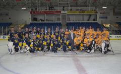 Group photo of MSP and Schoolcraft hockey teams