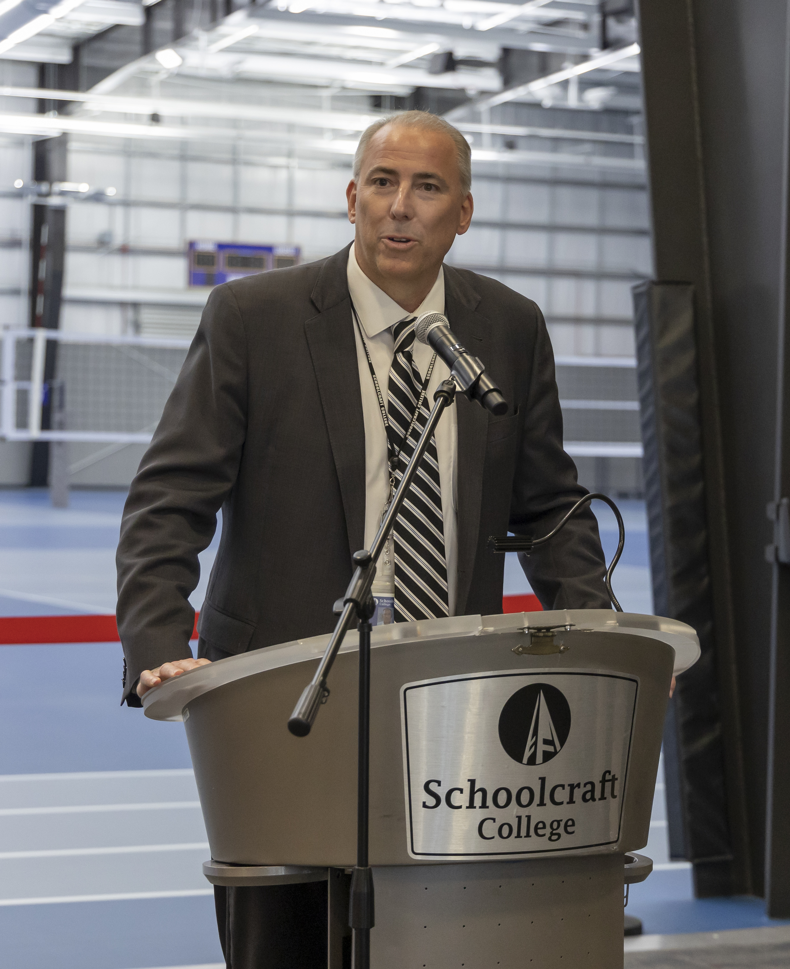 Dr. Cerny speaking at podium