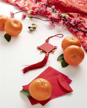 Red items, blossoms and tangerines