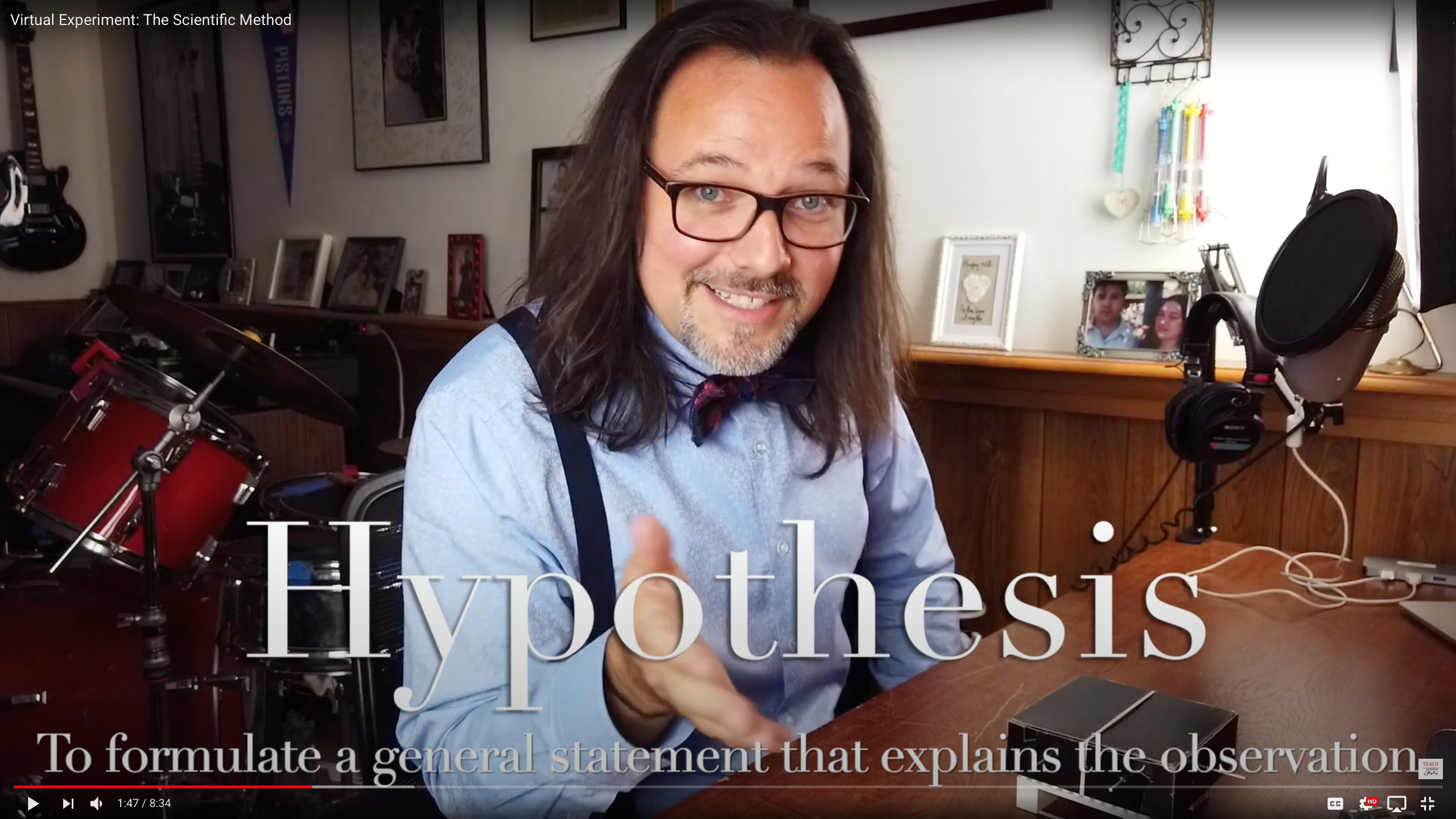Professor explaining hypothesis
