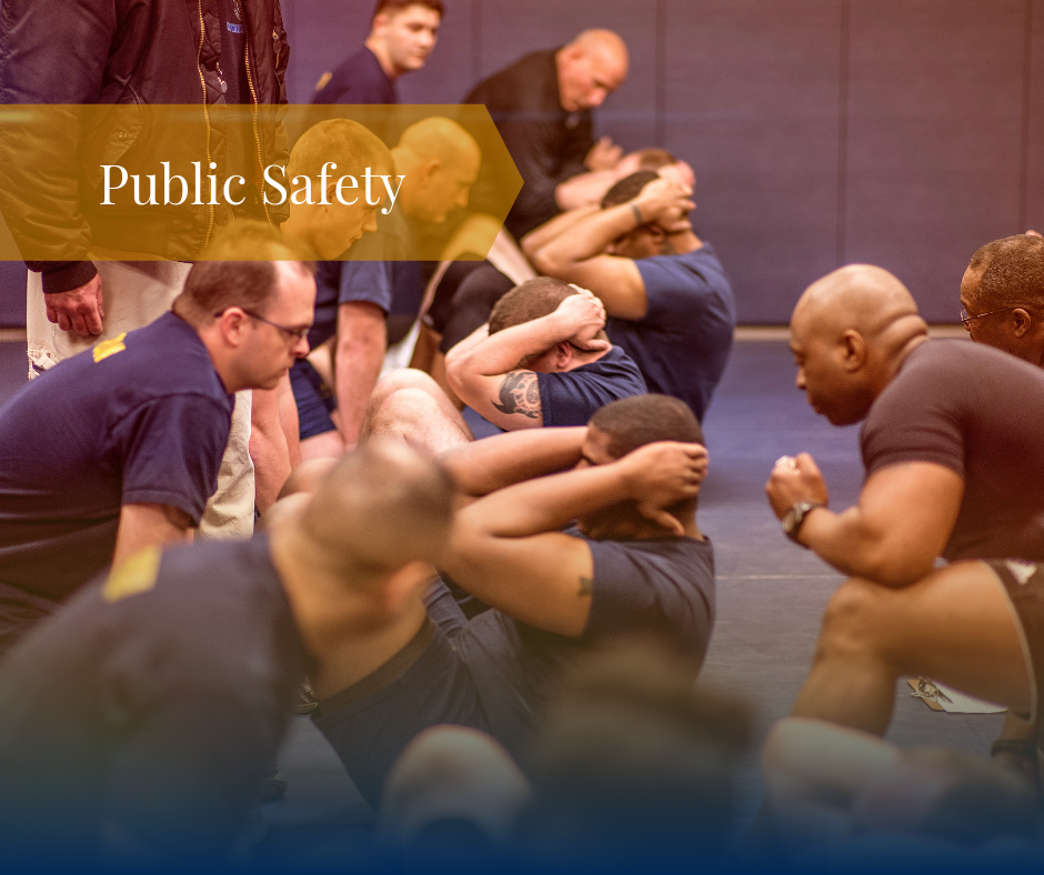 A group of police academy students doing sit ups with text that reads Public Safety